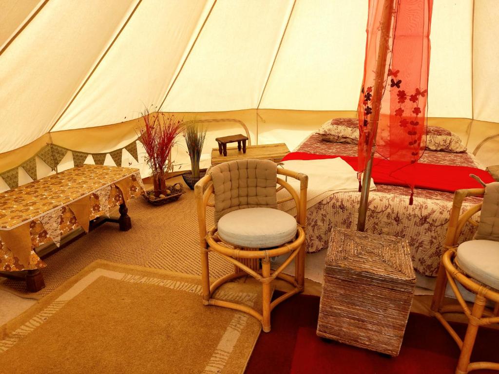 Bell Tent with seperate kitchen area one of three to rent nuit insolite Normandie Saint Michel de Montjoie 1